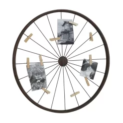 Metal Bike Wheel Wall Decor With Clothespin Photo Brown - Olivia & May 12 Metal Bike Wheel Wall Decor With Clothespin Photo Brown - Olivia & May -Household Improvement Store GUEST 5e8a9787 0dda 4145 8c88 9074719539c3