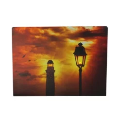 Northlight LED Lighted Lighthouse And Lantern Lamp Post With Amber Sky Canvas Wall Art 15.75" X 11.75"